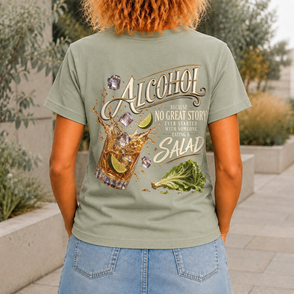 No Great Story Started With A Salad graphic printed on the back of a sage KRED Threads premium tee