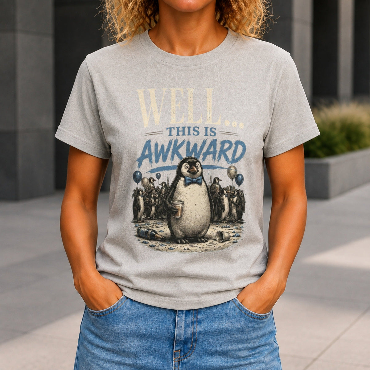 Well... This Is Awkward graphic printed on the front of a grey marble KRED Threads premium tee