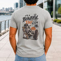 A Beautiful Day To Leave Me Alone graphic printed on the back of an athletic heather KRED Threads premium tee