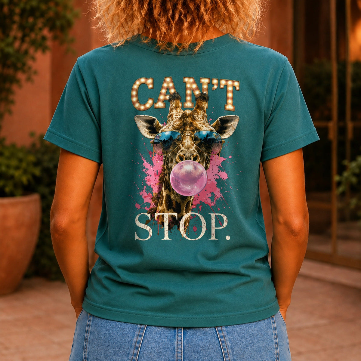 Can't Stop graphic printed on the back of a jade KRED Threads premium tee