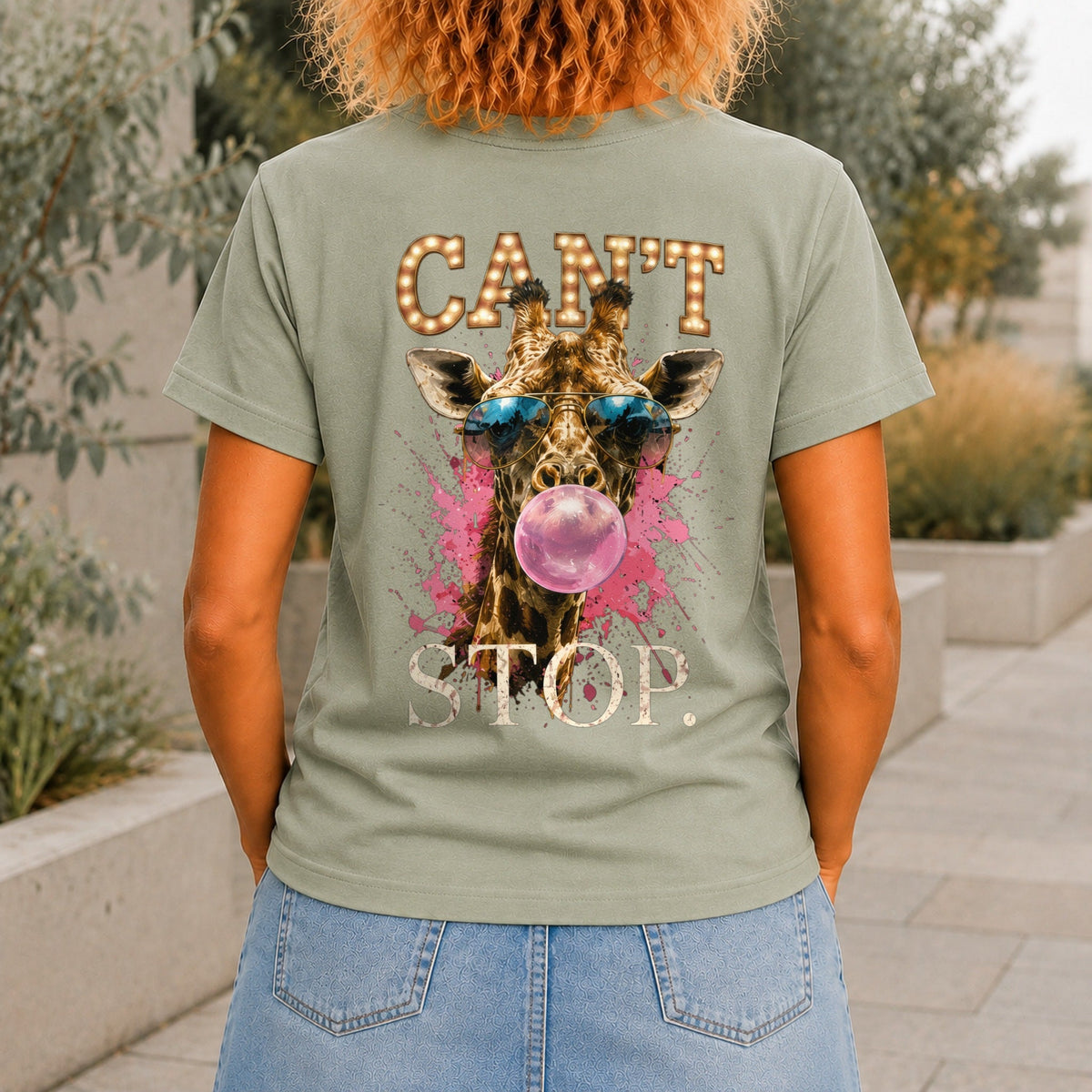 Can't Stop graphic printed on the back of a sage KRED Threads premium tee