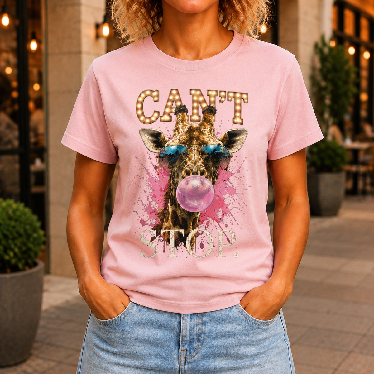 Can't Stop graphic printed on the front of a pink KRED Threads premium tee