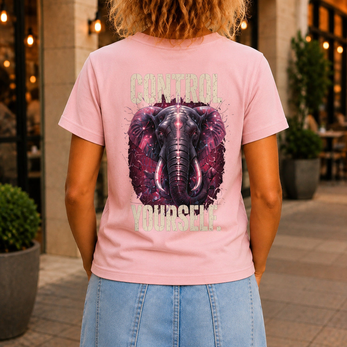 Control Yourself graphic printed on the back of a pink KRED Threads premium tee