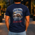 Every Bad Thing graphic printed on the back of a navy KRED Threads premium tee