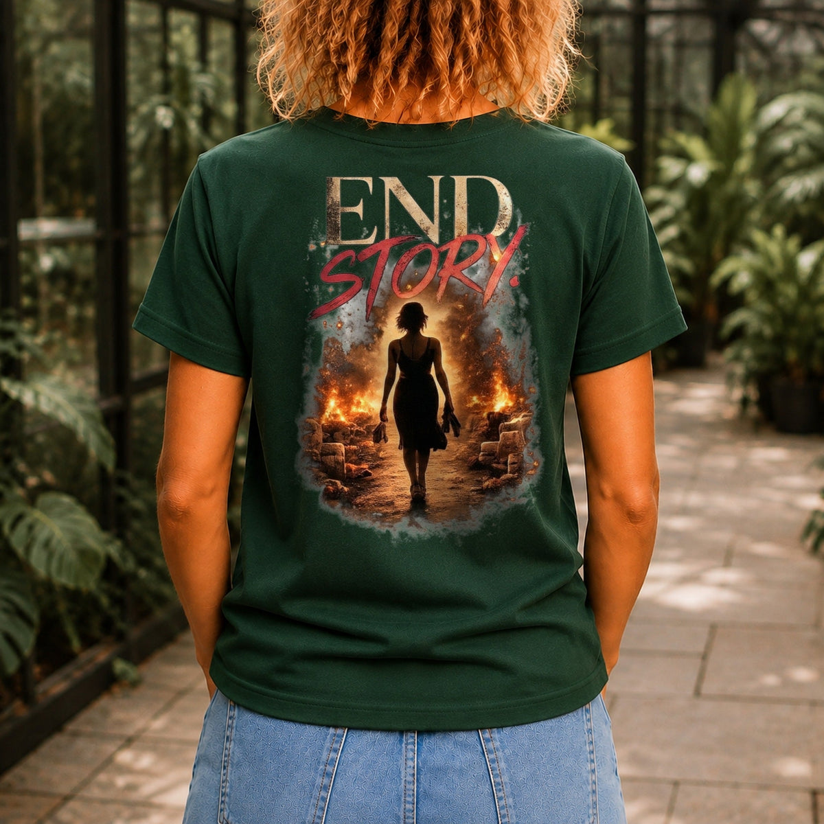 End Story graphic printed on the back of a forest green KRED Threads premium tee