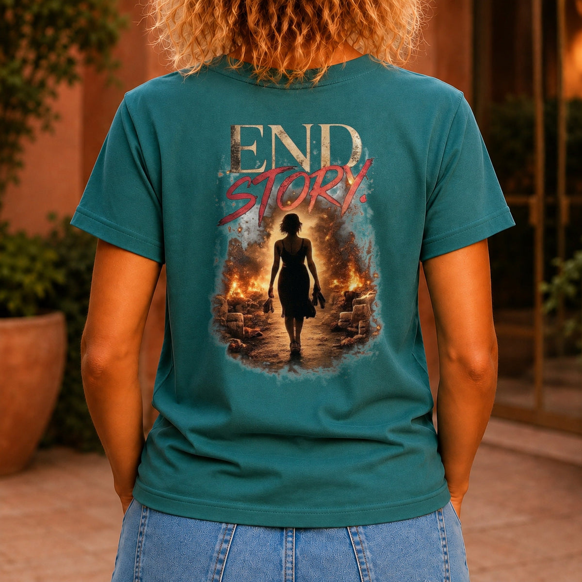 End Story graphic printed on the back of a jade KRED Threads premium tee