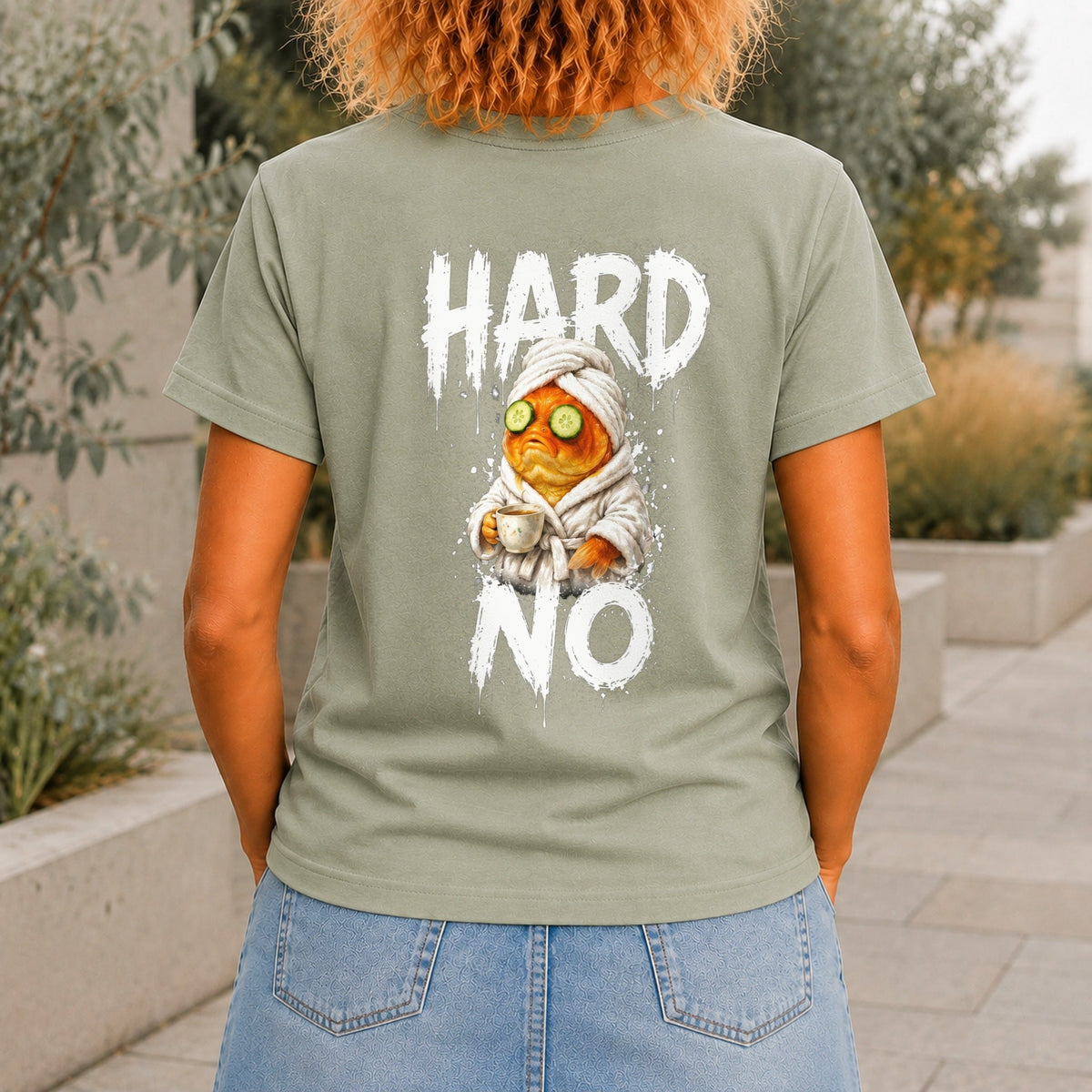 Hard No graphic printed on the back of a sage KRED Threads premium tee