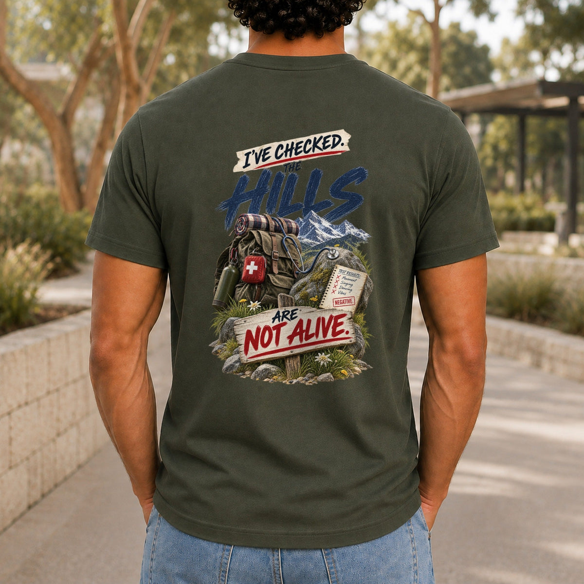 The Hills Are Not Alive graphic printed on the back of an army KRED Threads premium tee