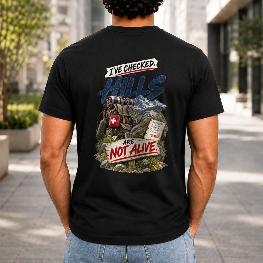 The Hills Are Not Alive graphic printed on the back of a black KRED Threads premium tee