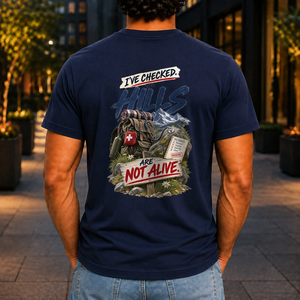 The Hills Are Not Alive graphic printed on the back of a navy KRED Threads premium tee