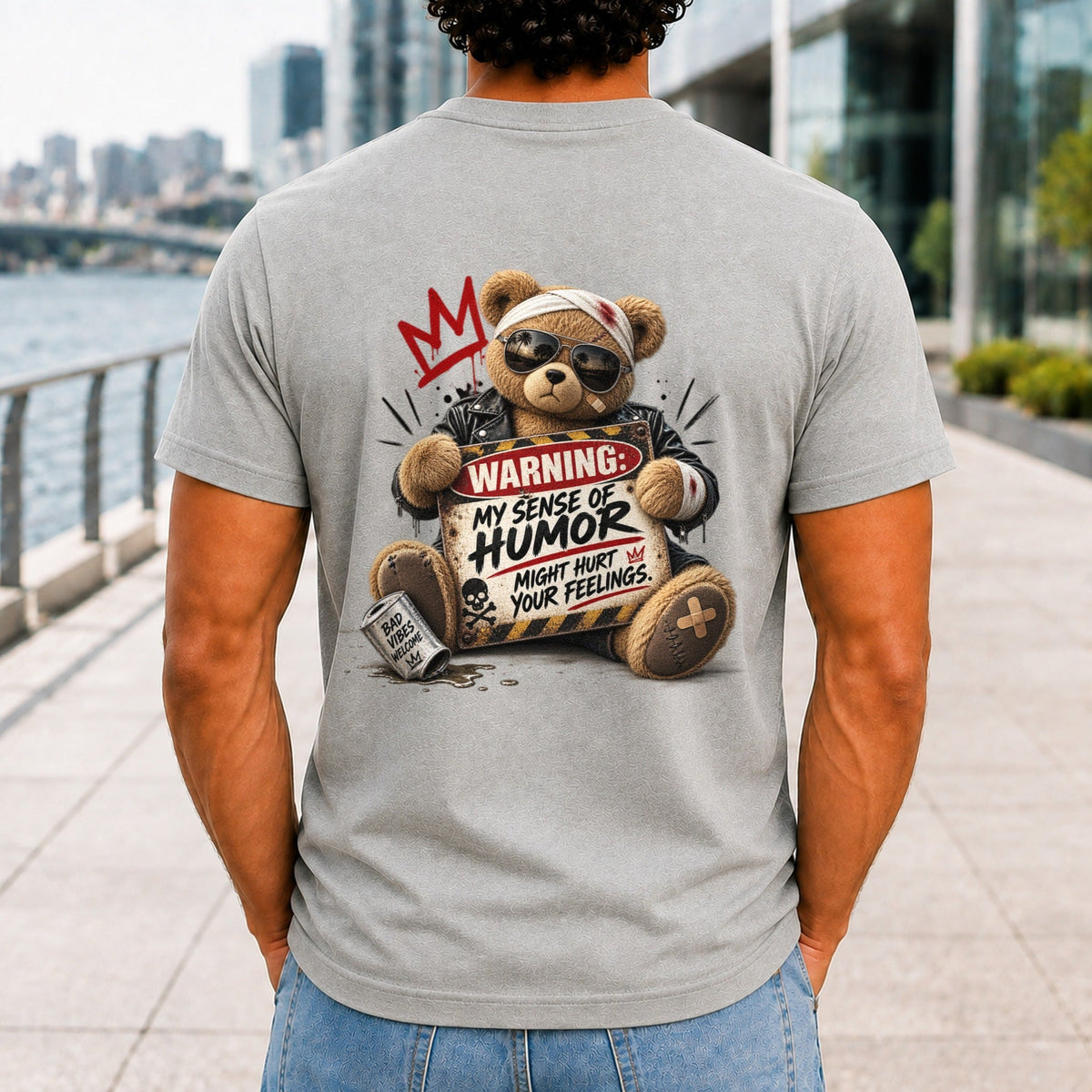 My Sense Of Humor Might Hurt Your Feelings graphic printed on the back of an athletic heather KRED Threads premium tee