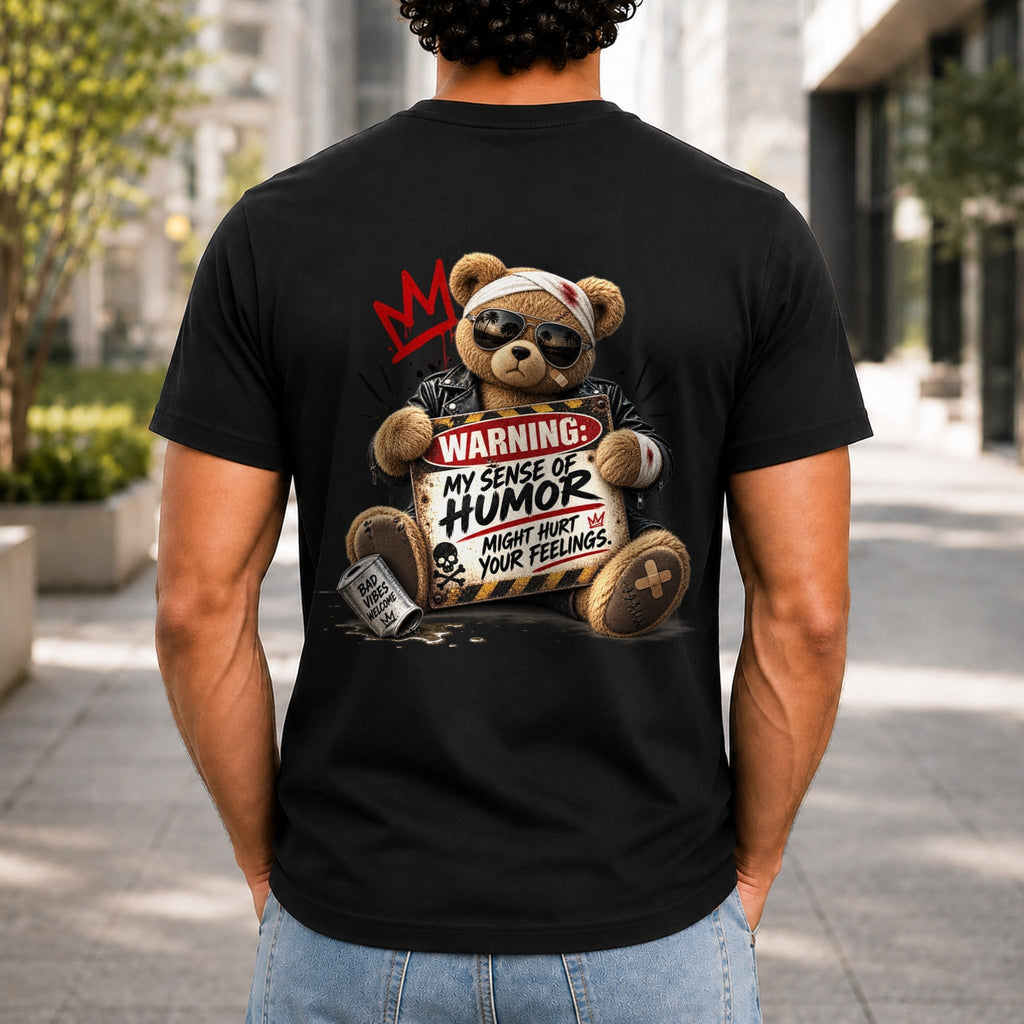 My Sense Of Humor Might Hurt Your Feelings graphic printed on the back of a black KRED Threads premium tee