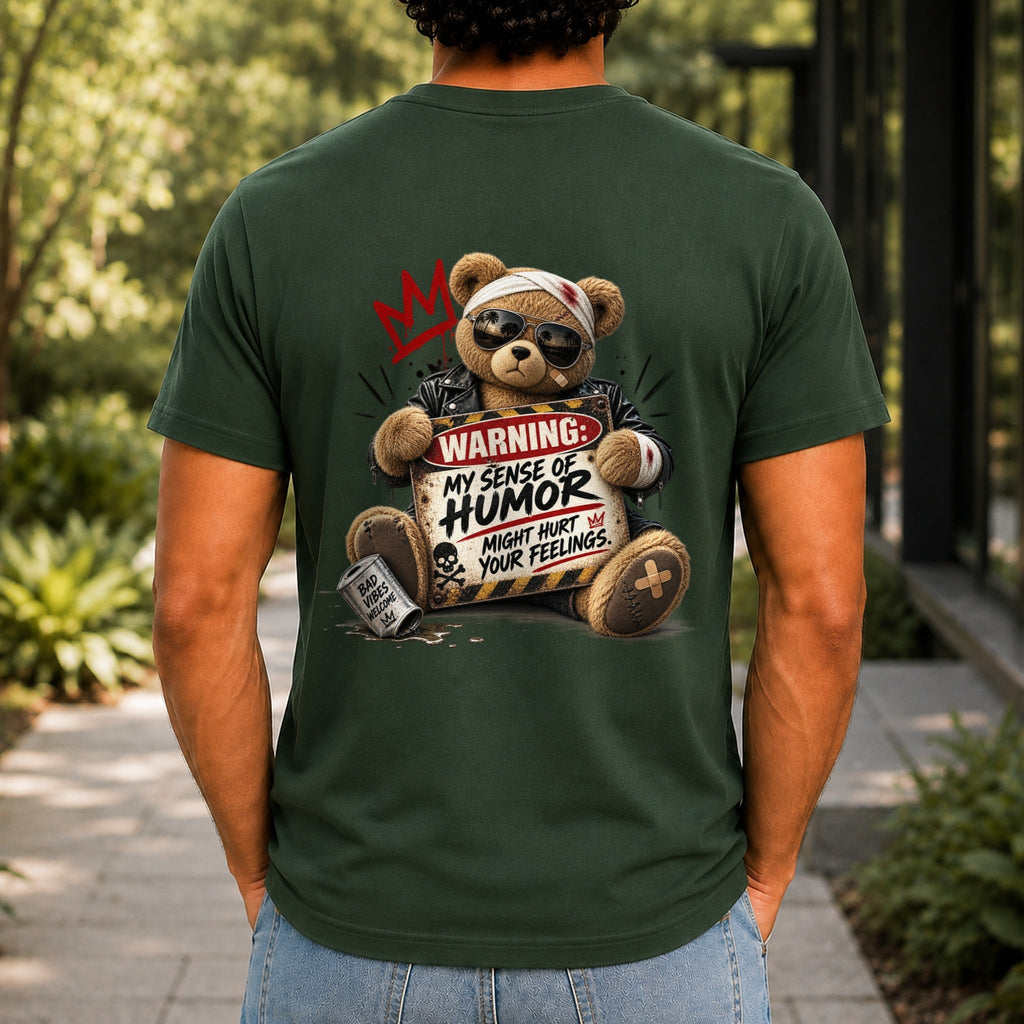 My Sense Of Humor Might Hurt Your Feelings graphic printed on the back of a forest green KRED Threads premium tee