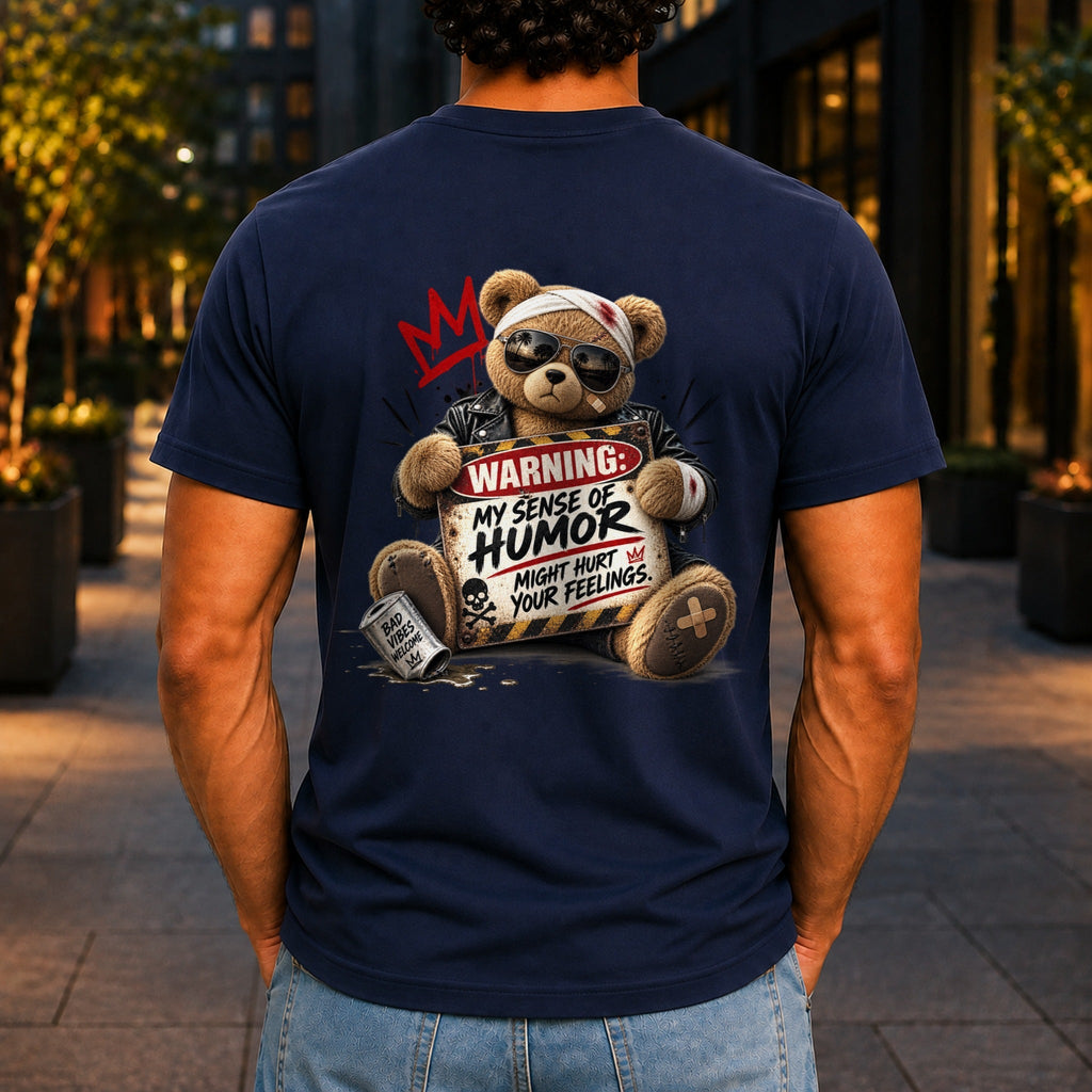 My Sense Of Humor Might Hurt Your Feelings graphic printed on the back of a navy KRED Threads premium tee
