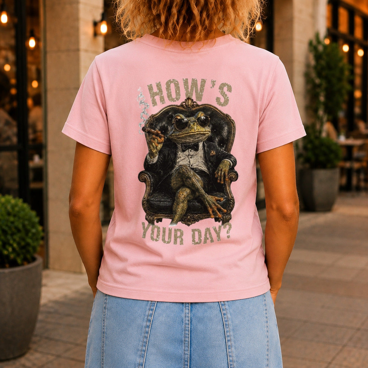 How's Your Day graphic printed on the back of a pink KRED Threads premium tee