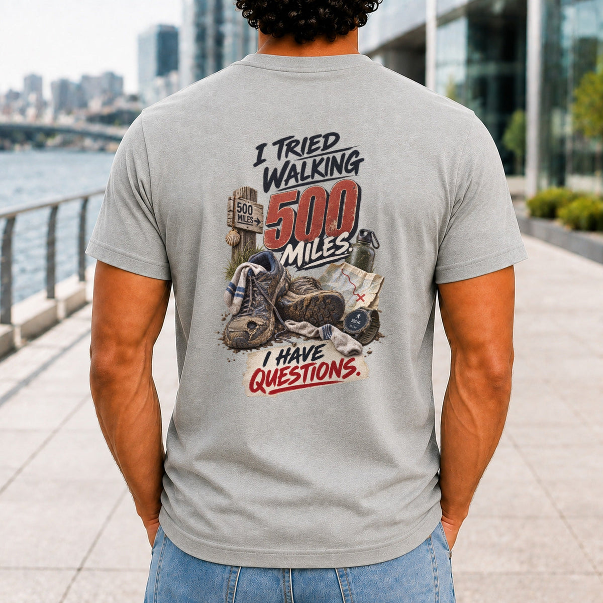 I Tried Walking 500 Miles graphic printed on the back of an athletic heather KRED Threads premium tee