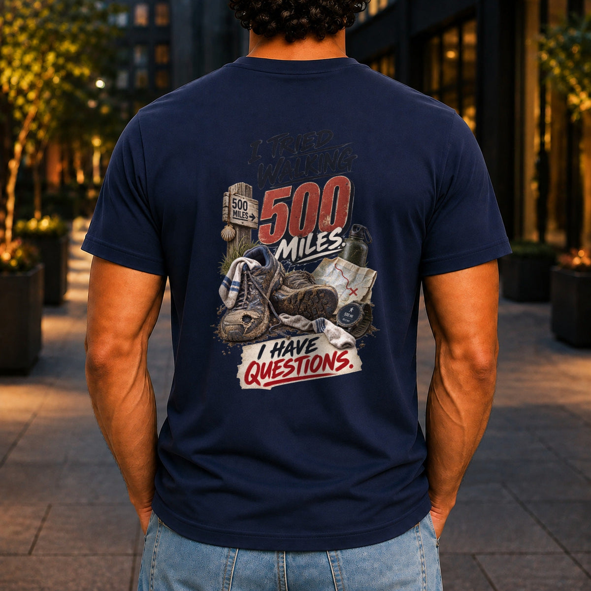 I Tried Walking 500 Miles graphic printed on the back of a navy KRED Threads premium tee