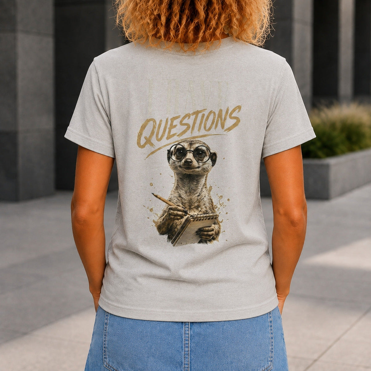 I Have Questions graphic printed on the back of a grey marble KRED Threads premium tee