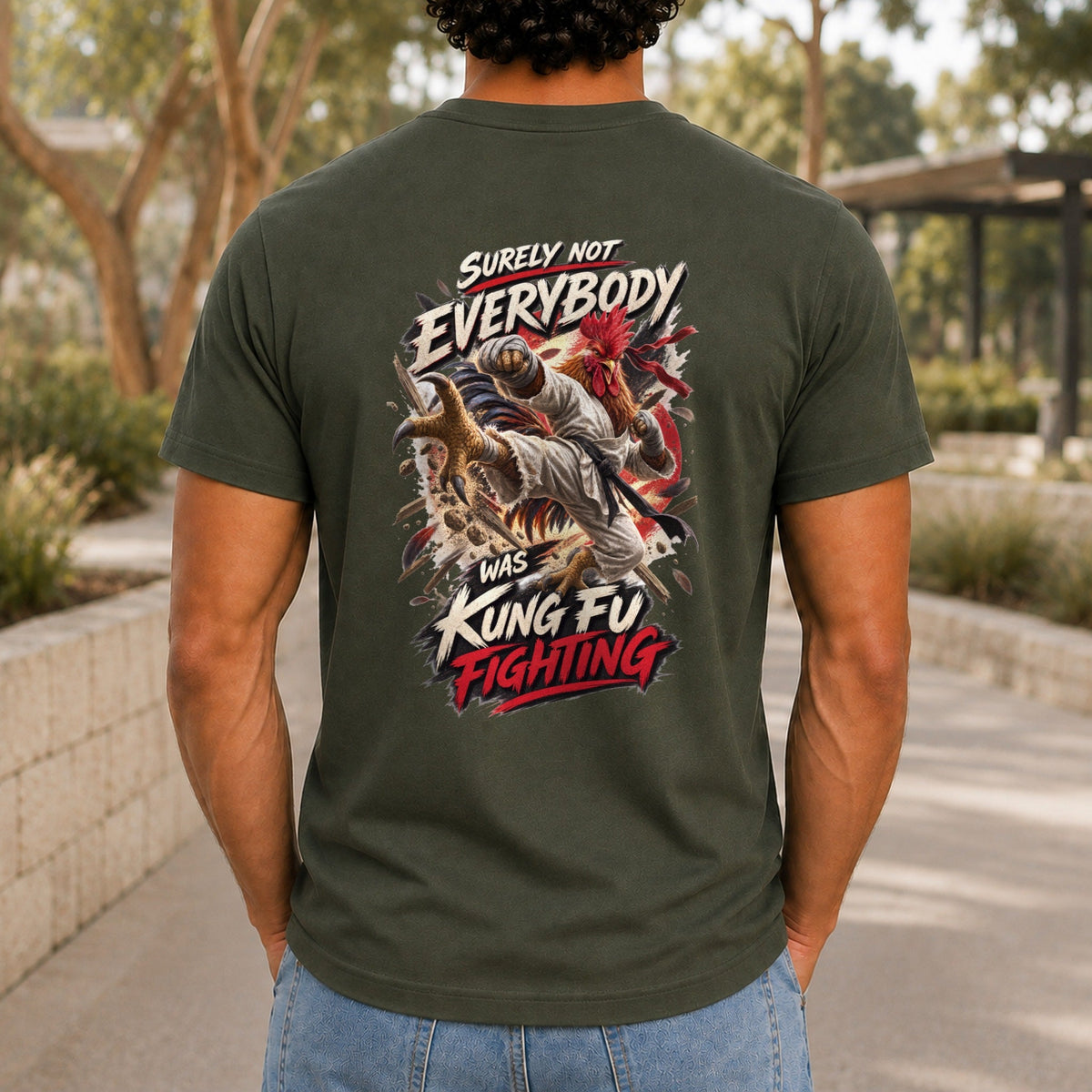 Surely Not Everybody Was Kung Fu Fighting graphic printed on the back of an army KRED Threads premium tee