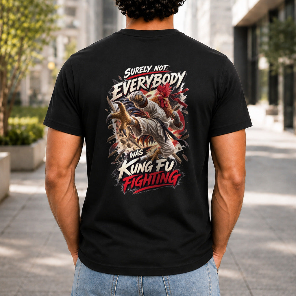 Surely Not Everybody Was Kung Fu Fighting graphic printed on the back of a black KRED Threads premium tee