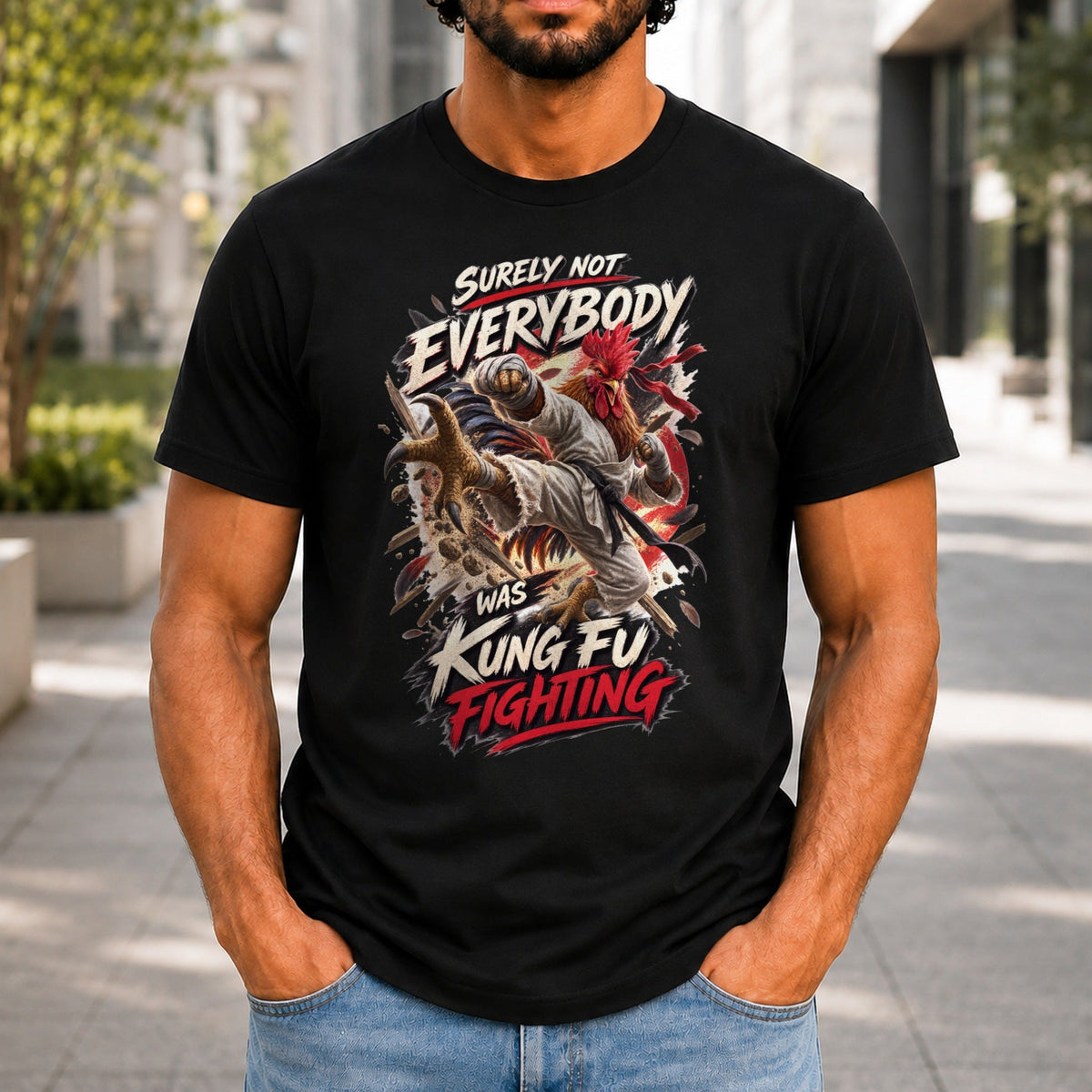 Surely Not Everybody Was Kung Fu Fighting graphic printed on the front of a black KRED Threads premium tee