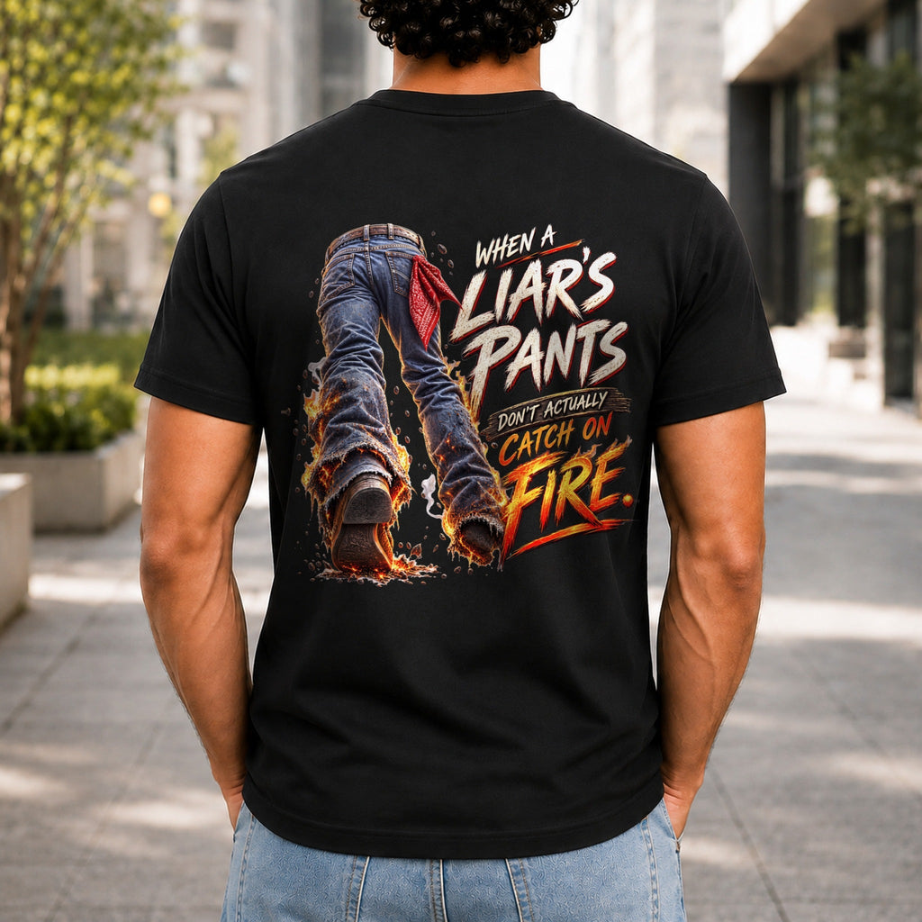 When A Liar's Pants Don't Catch Fire graphic printed on the back of a black KRED Threads premium tee