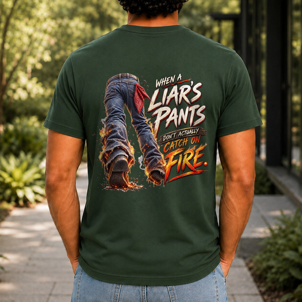 When A Liar's Pants Don't Catch Fire graphic printed on the back of a forest green KRED Threads premium tee
