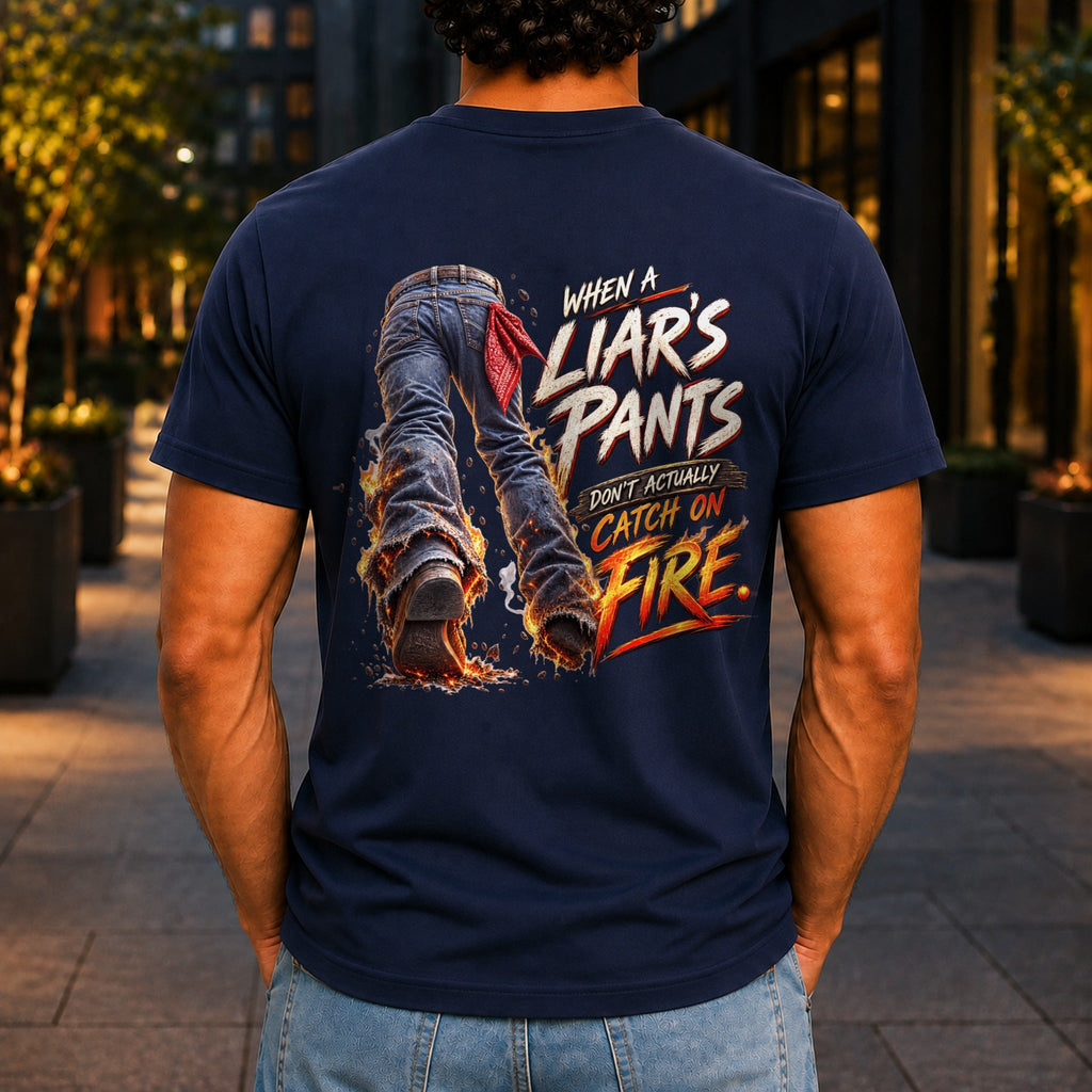 When A Liar's Pants Don't Catch Fire graphic printed on the back of a navy KRED Threads premium tee