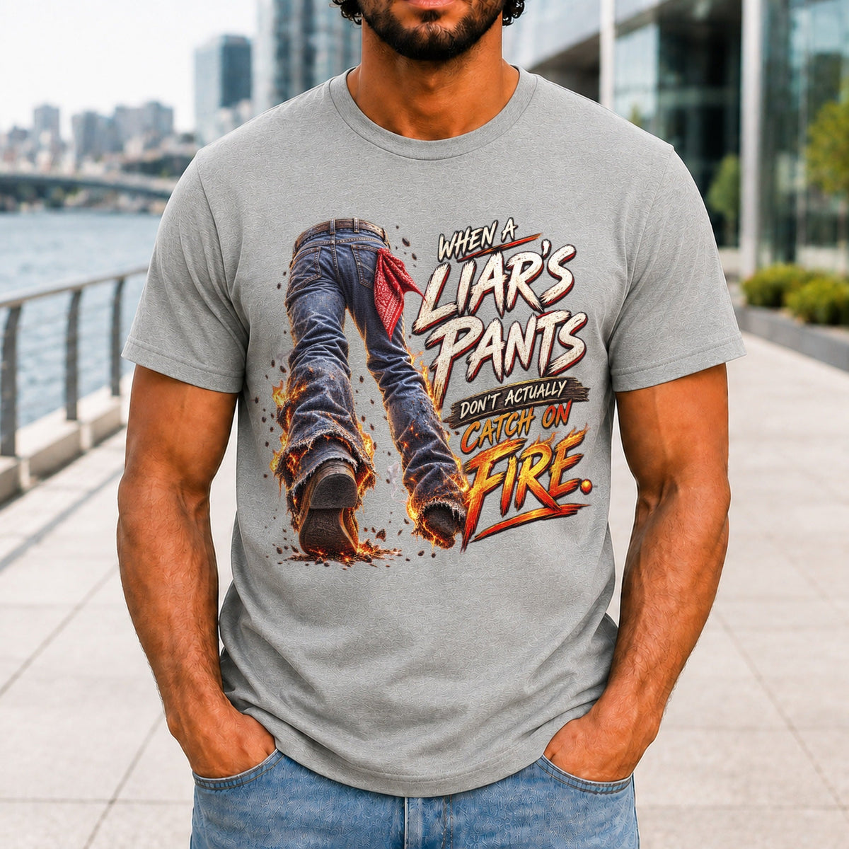 When A Liar's Pants Don't Catch Fire graphic printed on the front of an athletic heather KRED Threads premium tee