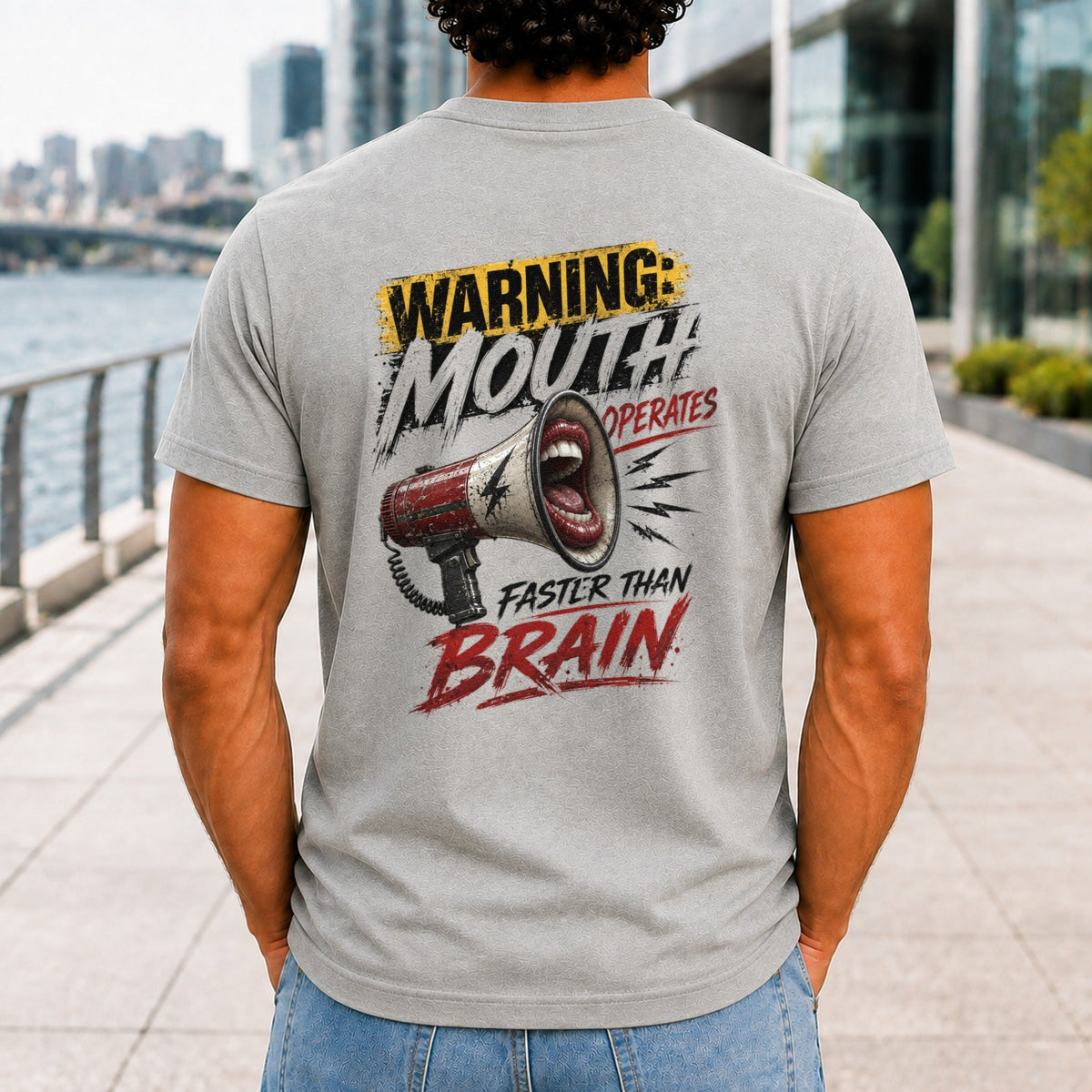 Mouth Operates Faster Than Brain graphic printed on the back of an athletic heather KRED Threads premium tee