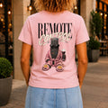 Remote Control graphic printed on the back of a pink KRED Threads premium tee