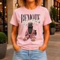 Remote Control graphic printed on the front of a pink KRED Threads premium tee
