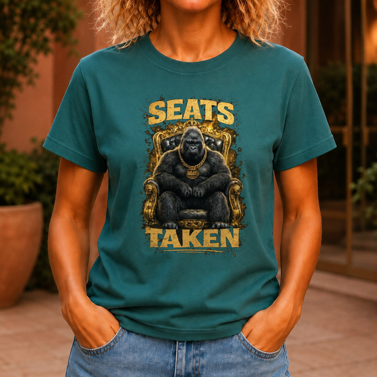 Seats Taken graphic printed on the front of a jade KRED Threads premium tee
