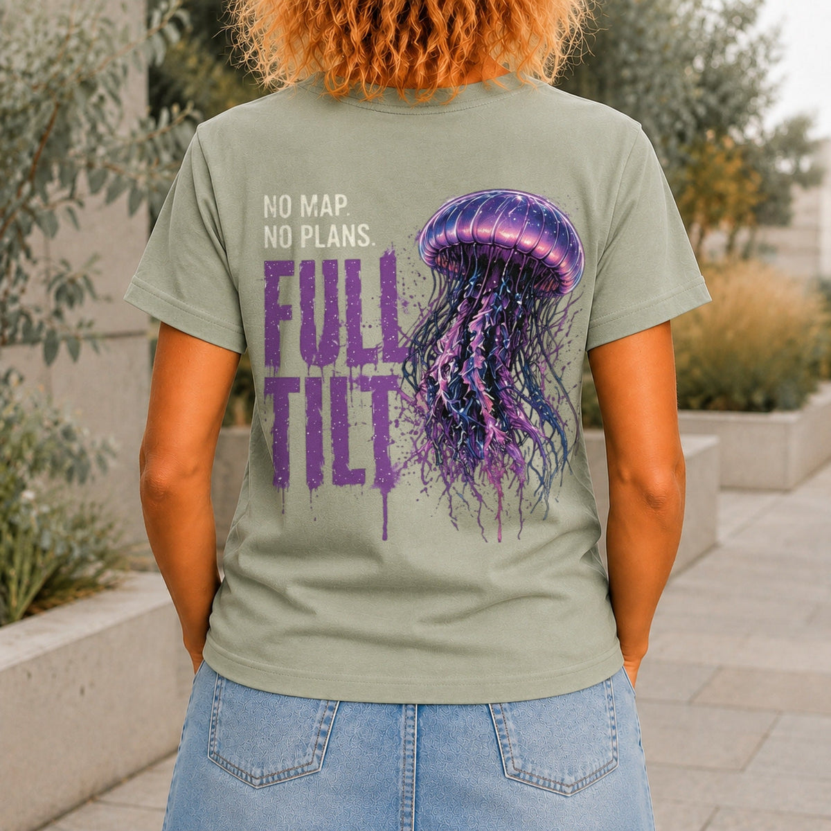 No Map. No Plans. Full Tilt. graphic printed on the back of a sage KRED Threads premium tee