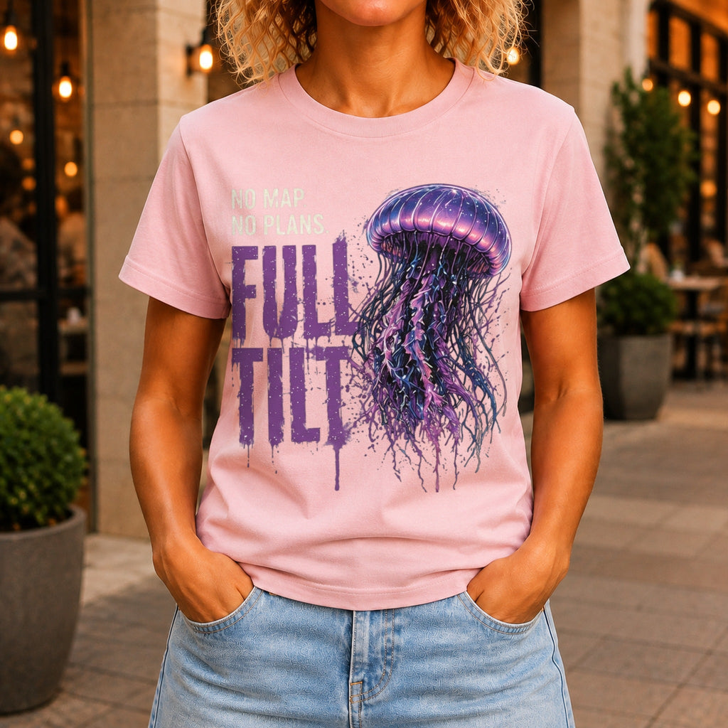 No Map. No Plans. Full Tilt. graphic printed on the front of a pink KRED Threads premium tee