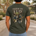 Turn It Up graphic printed on the back of an army KRED Threads premium tee