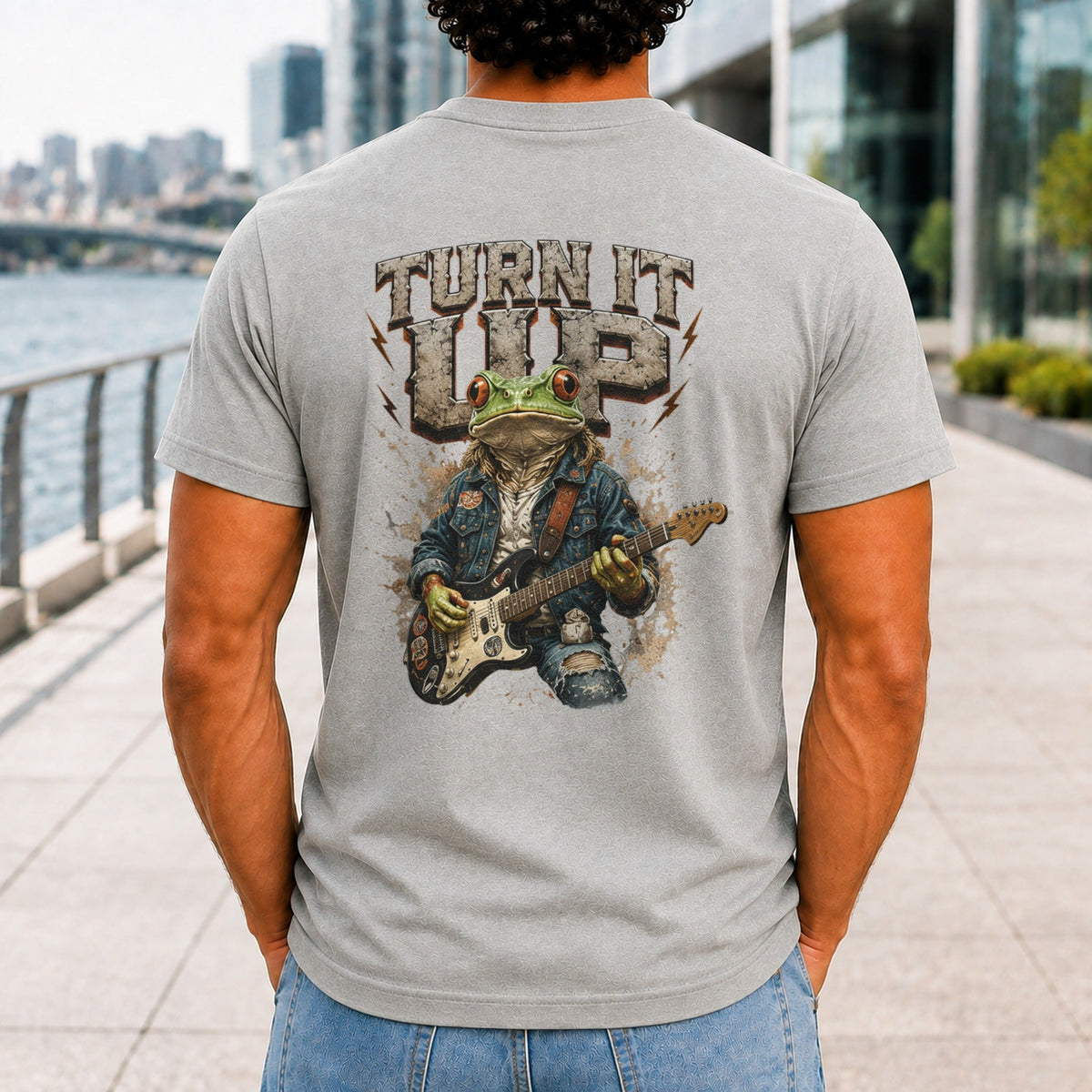 Turn It Up graphic printed on the back of an athletic heather KRED Threads premium tee