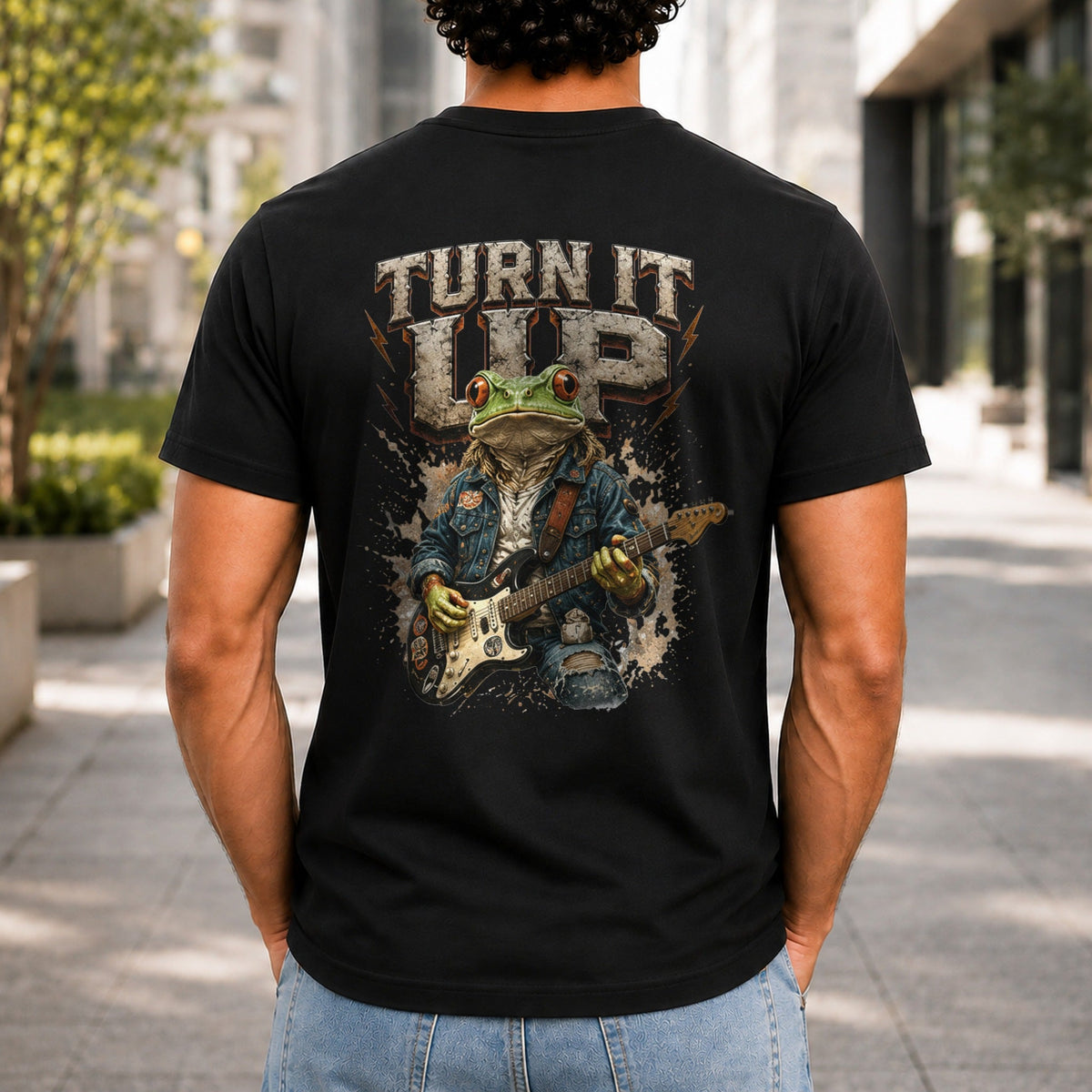 Turn It Up graphic printed on the back of a black KRED Threads premium tee