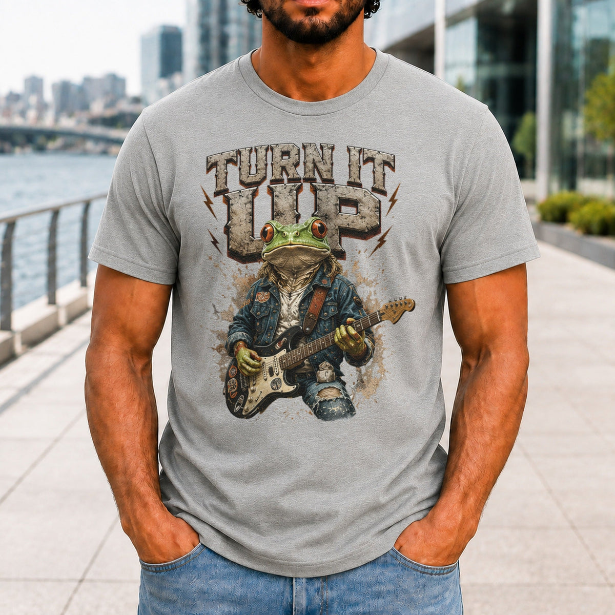 Turn It Up graphic printed on the front of an athletic heather KRED Threads premium tee