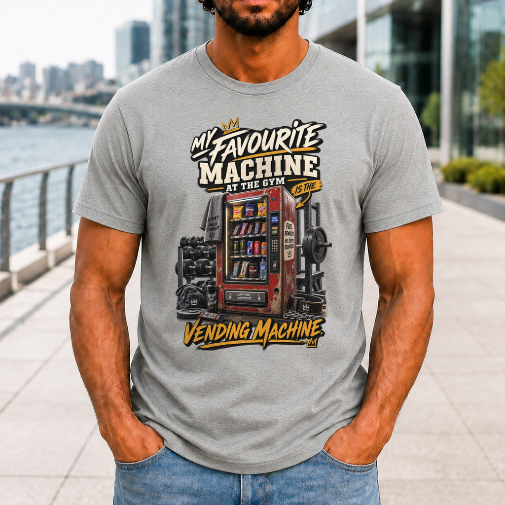 My Favourite Machine At The Gym graphic printed on the front of an athletic heather KRED Threads premium tee