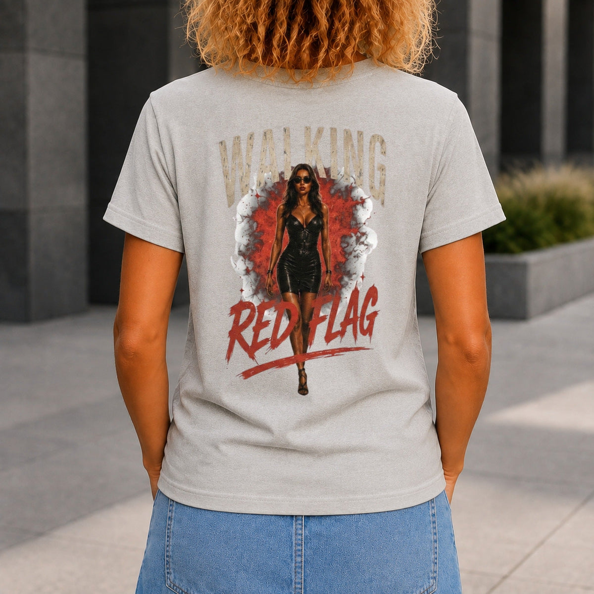 Walking Red Flag graphic printed on the back of a grey marble KRED Threads premium tee