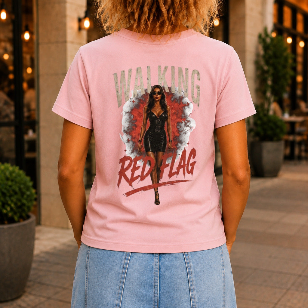 Walking Red Flag graphic printed on the back of a pink KRED Threads premium tee