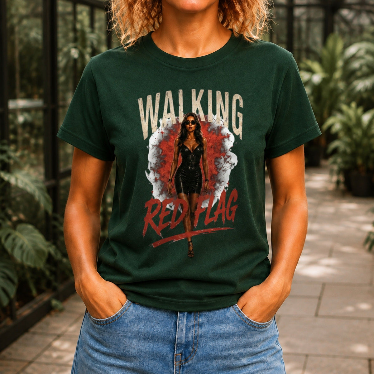 Walking Red Flag graphic printed on the front of a forest green KRED Threads premium tee