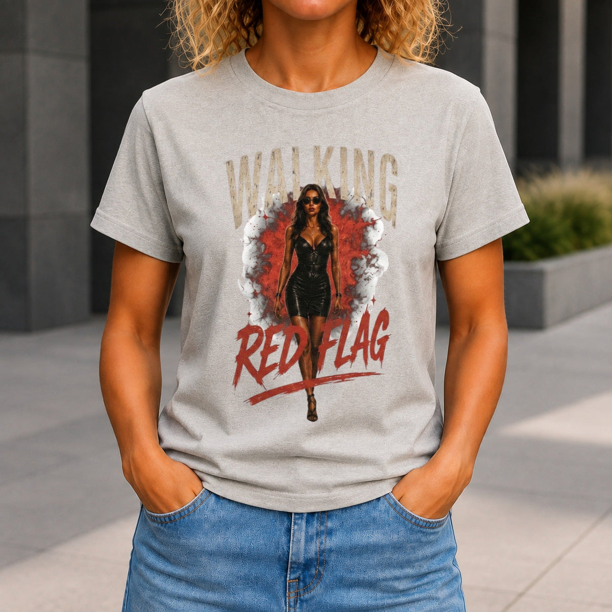 Walking Red Flag graphic printed on the front of a grey marble KRED Threads premium tee