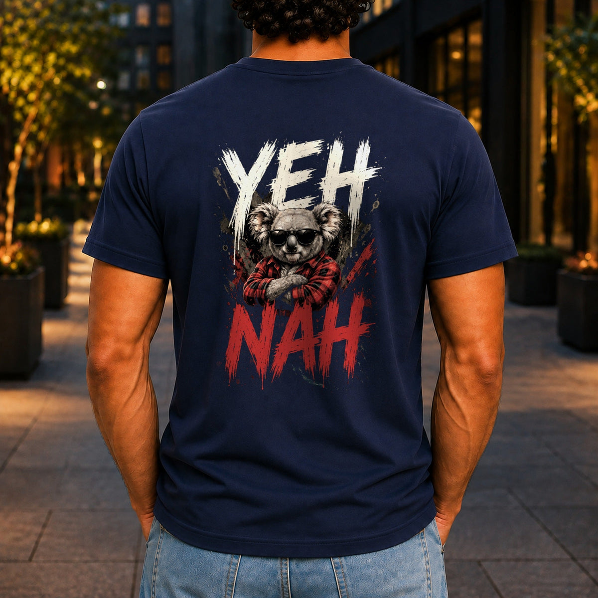 Yeh Nah graphic printed on the back of a navy KRED Threads premium tee