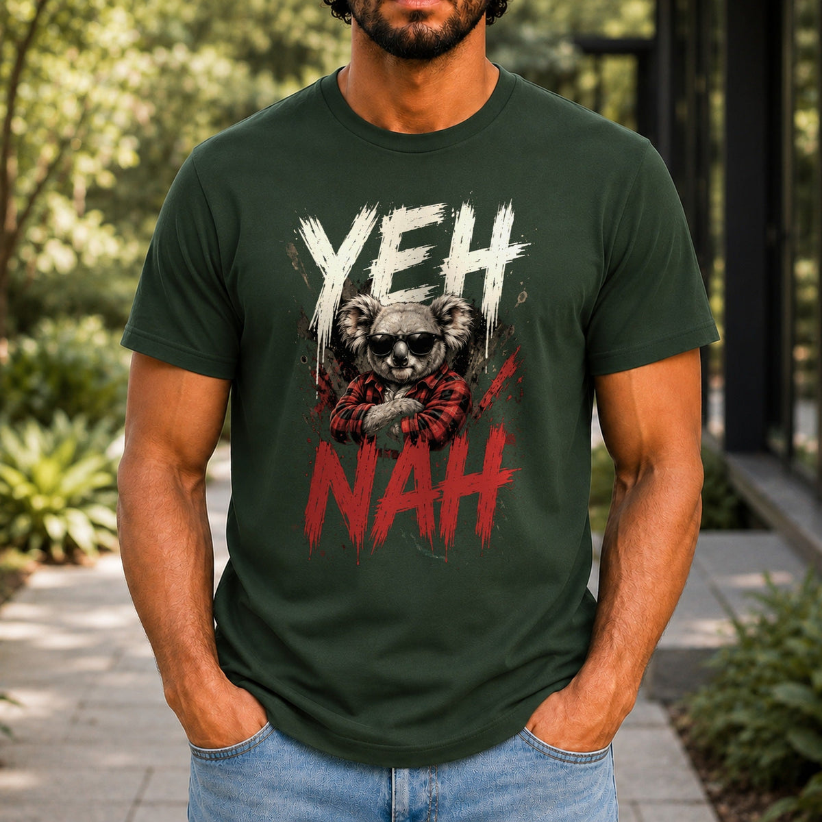Yeh Nah graphic printed on the front of a forest green KRED Threads premium tee